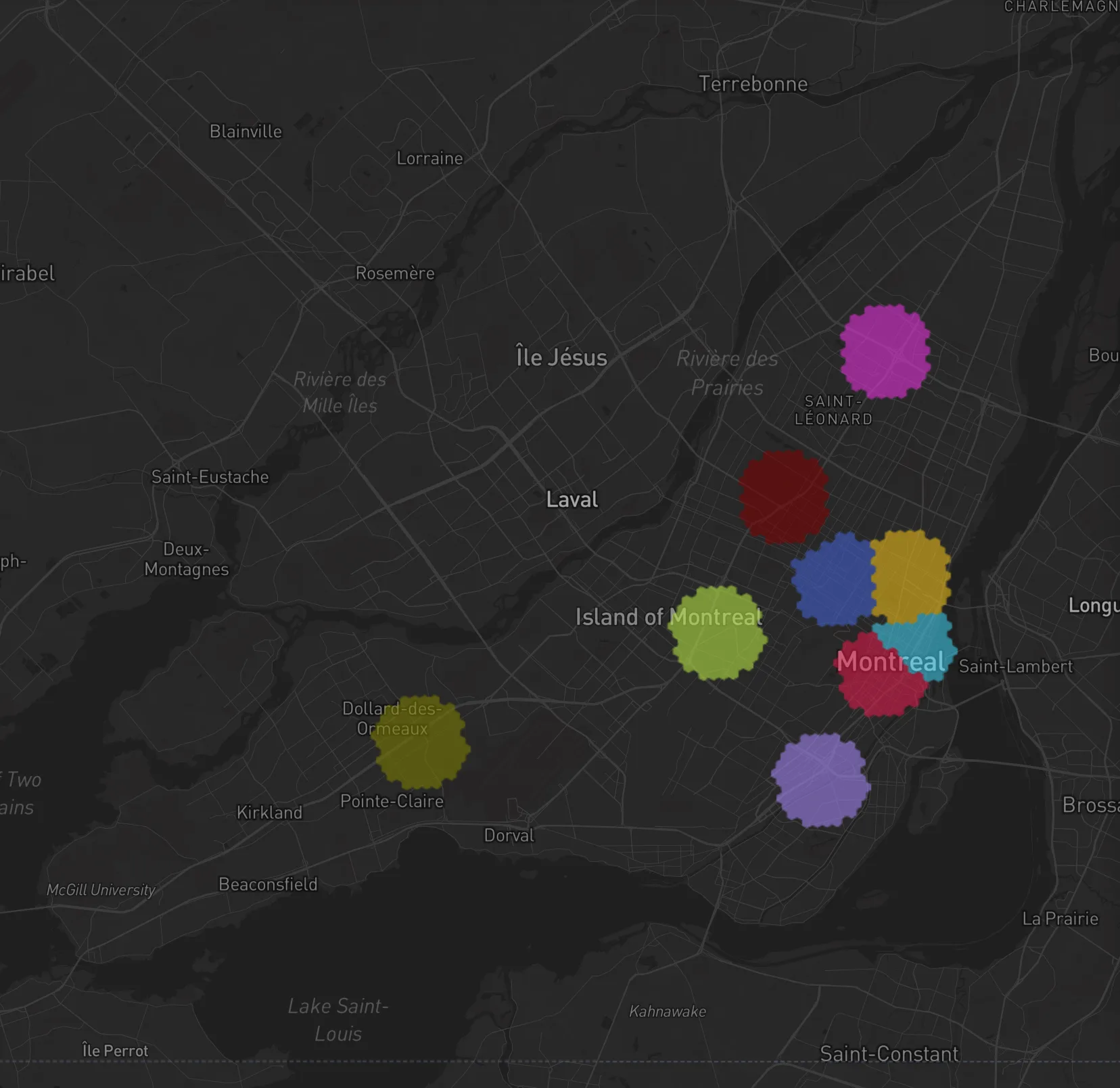 The island of Montreal early in the Grow step: nine round colored areas, each spreading out from its starting hex - small and close together downtown, farther apart in the north-east, the middle and the West Island