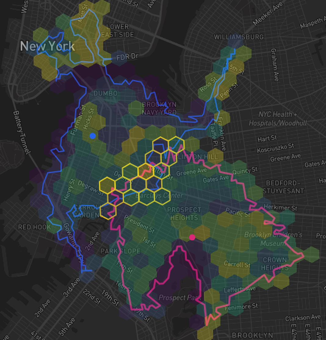 Territory map of New York City showing two 10-minute drive-time catchments drawn as H3 hex areas, with the hexes shared by both territories highlighted in gold as the overlap area