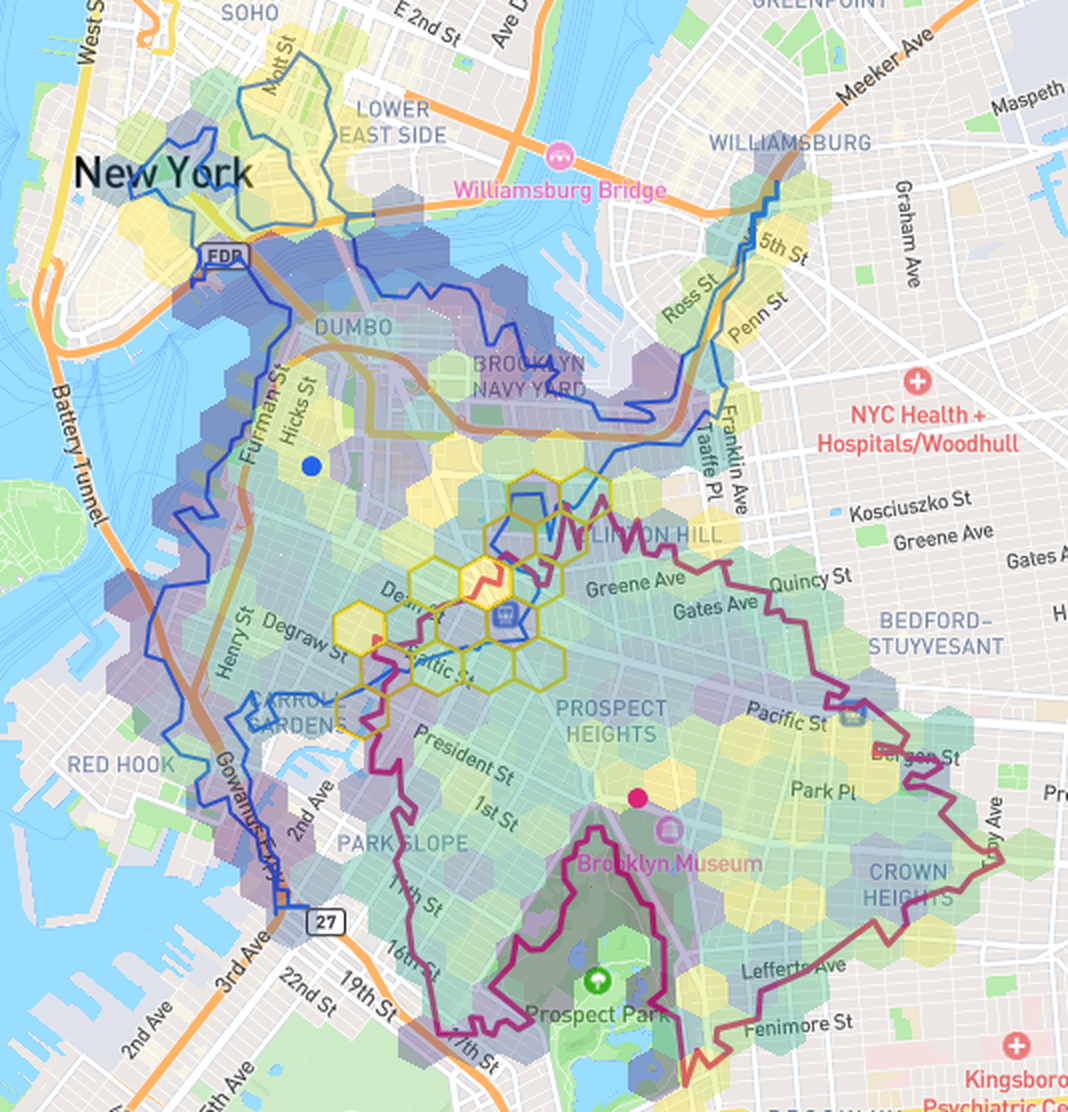Territory map of New York City showing two 10-minute drive-time catchments drawn as H3 hex areas, with the hexes shared by both territories highlighted in gold as the overlap area